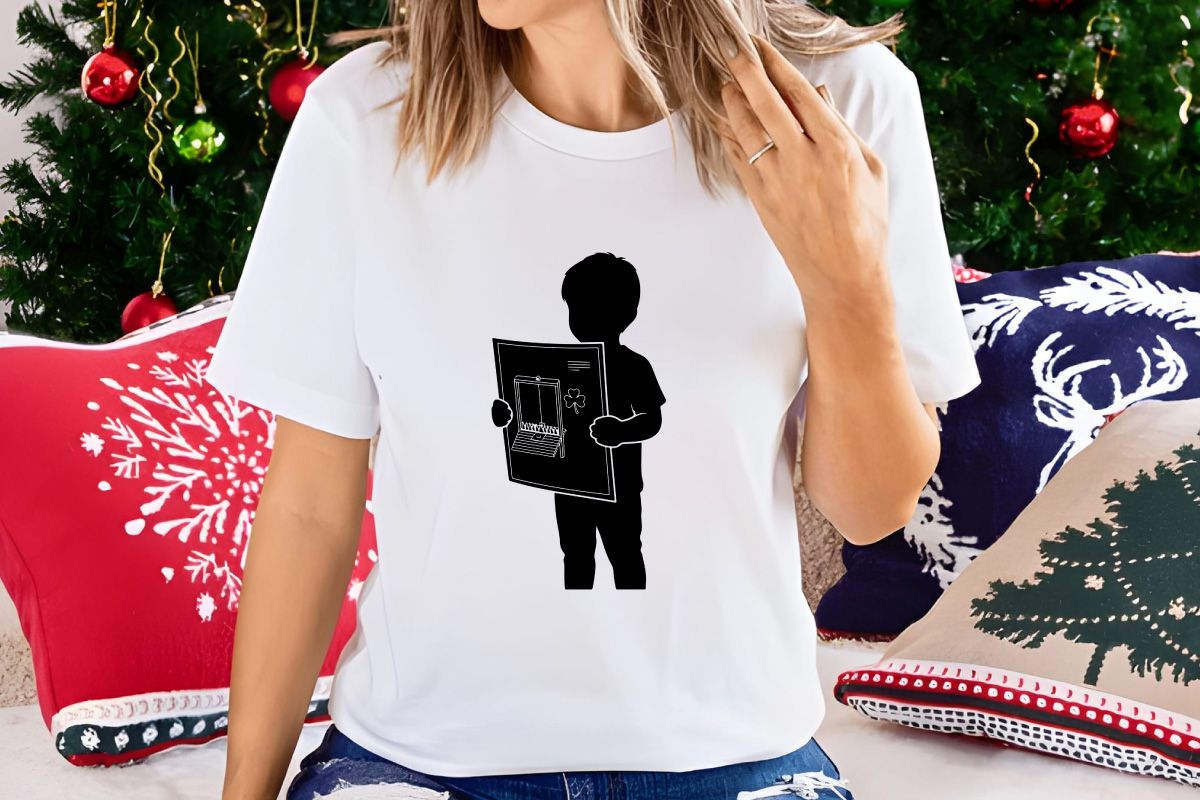 Child Holding Artwork with Shamrock