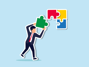 smart businessman solving jigsaw puzzle problem