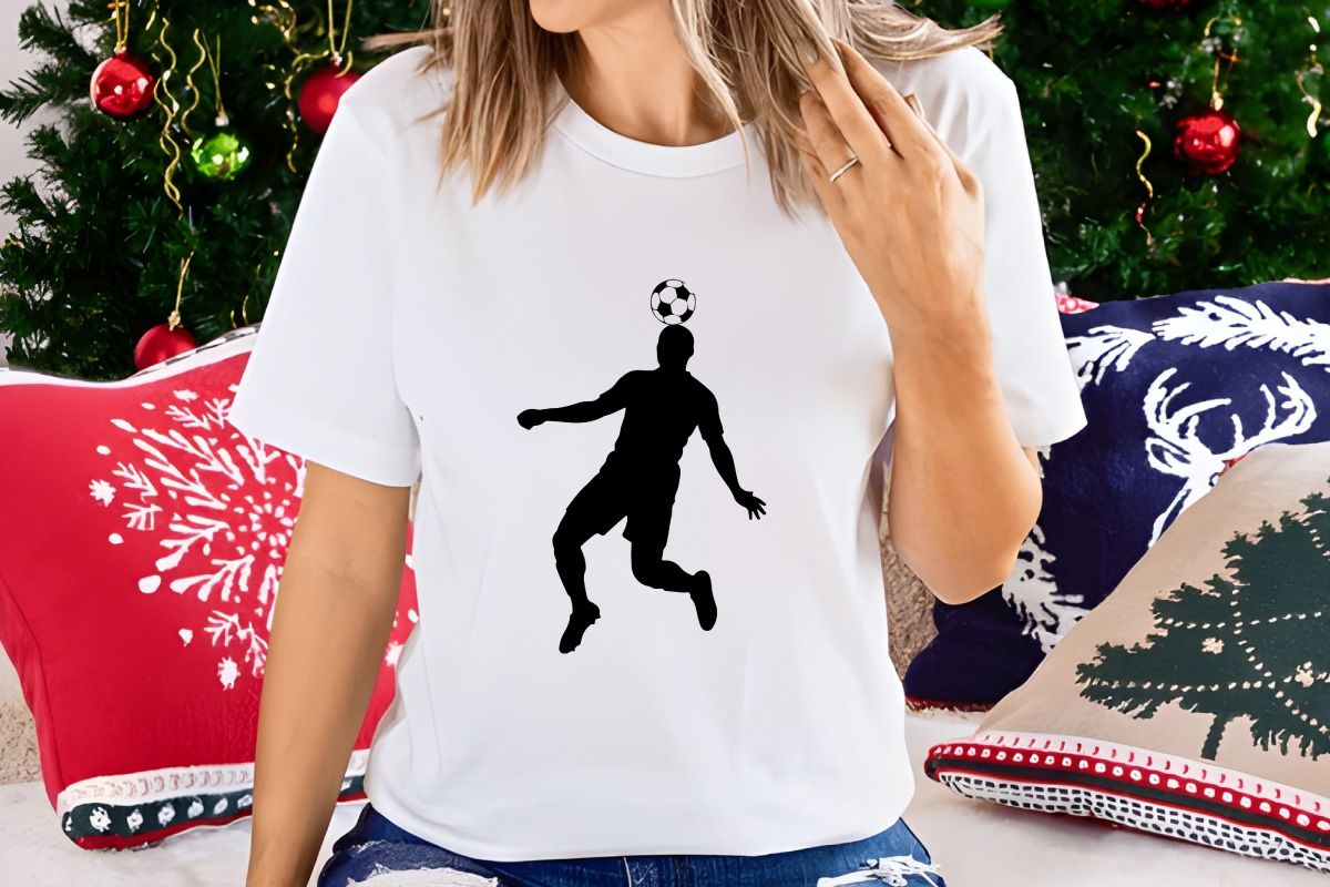 Soccer player in mid air heading a ball in a dynamic motion