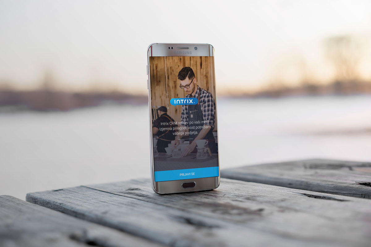 Android Phone On Wooden Table