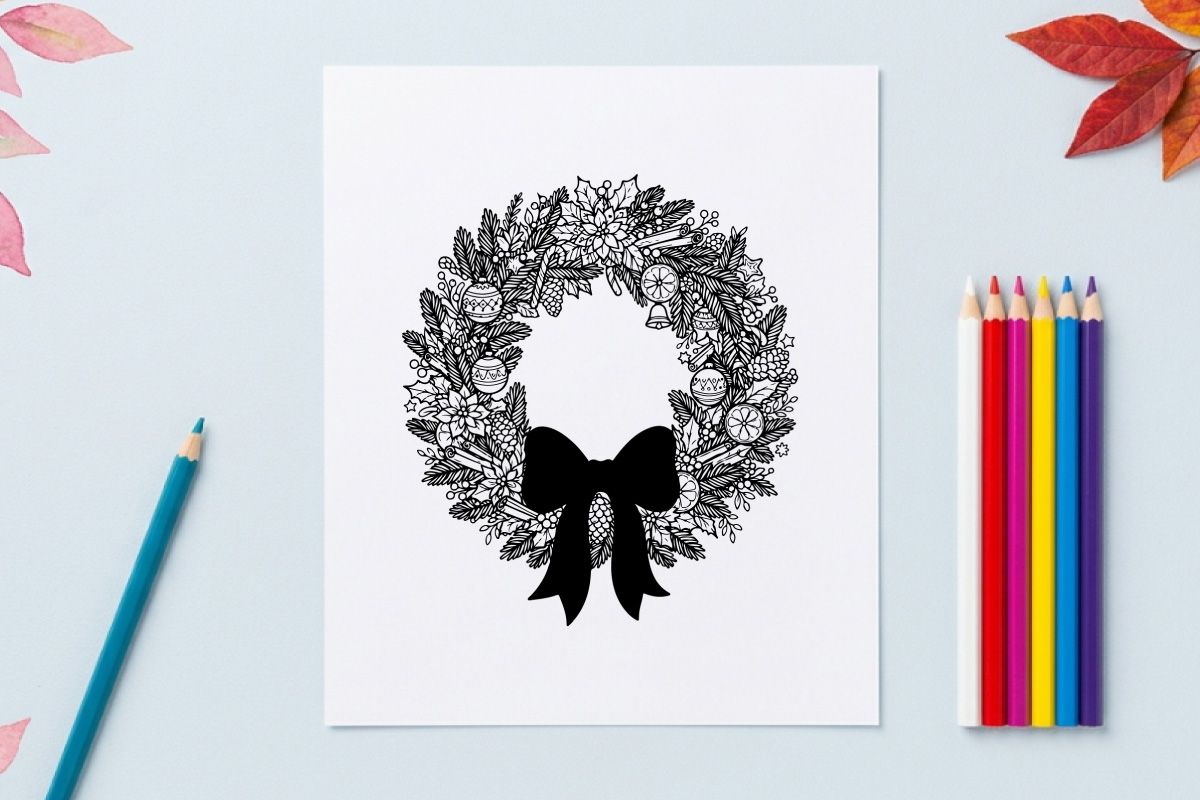 Hand drawn Christmas wreath with red bow isolated on white background