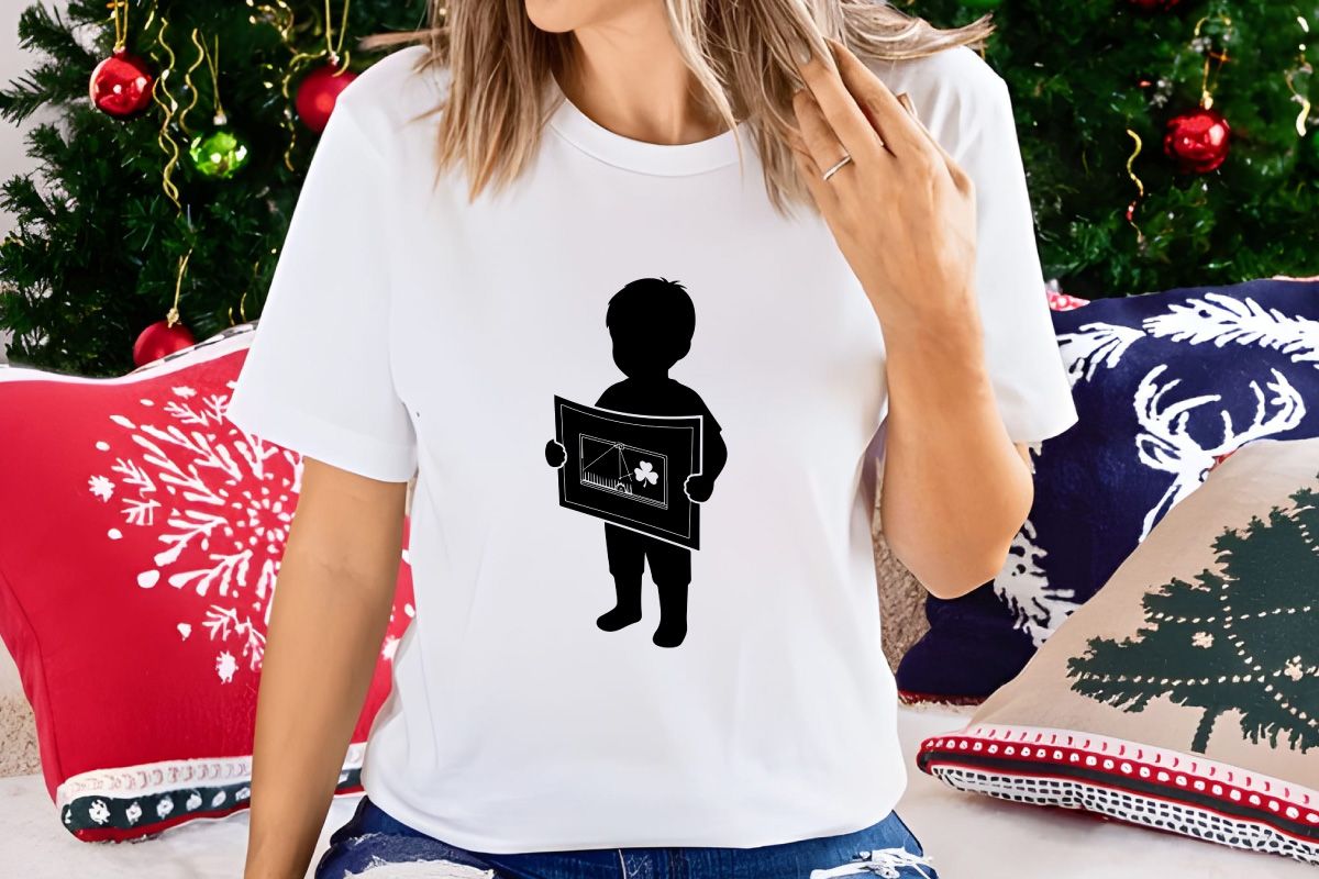 Child Holding Artwork with Shamrock