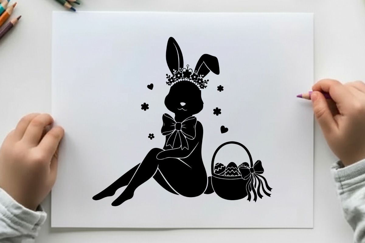 Easter bunny silhouette with crown and basket of eggs