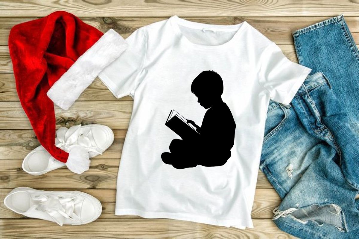 Boy Reading Book Silhouette